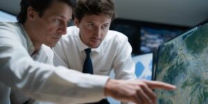 People looking at geographic data